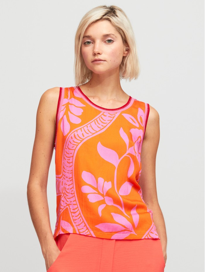 Top Corina. Colección SS24 Aldo Martins en candelascloset. Estampado floral naranja y rosa con tirantes anchos para mujer.