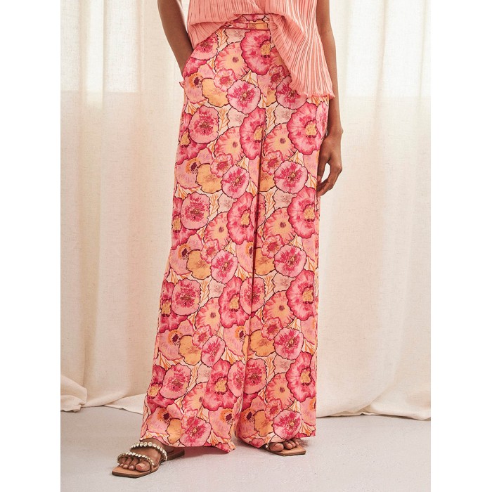 Pantalón largo de mujer Yanra. Colección SS24 NKN Nekane en candelascloset. Estilo palazzo con estampado floral y bolsillos.