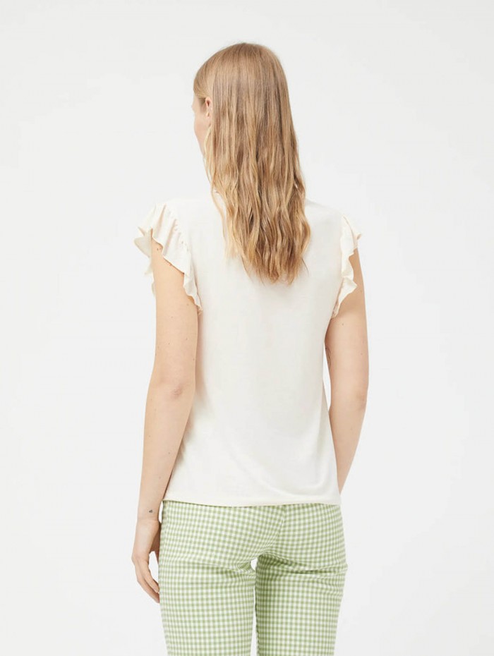Top de mujer Voila. Colección SS24 Compañía Fantástica en candelascloset. Color crudo, escote pico y manga corta con volantes. 2