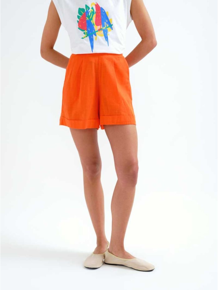 SHORTS ORANGE COMPAÑÍA...